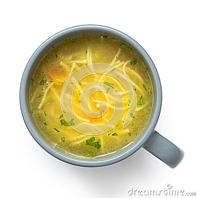 Instant chicken noodle soup in a grey ceramic mug isolated on white. Top view Stock Photo