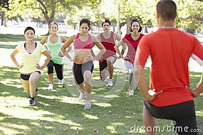 Instructor Running Fitness Boot Camp Stock Photo