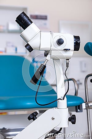 Instrument gynecologist colposcope gynecological room white blue background tool office operation surgery Stock Photo