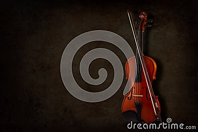 Instrument for violin and orchestra on a dark background. Place for inscription Stock Photo