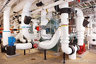 Insulated industrial piping in an HVAC system. Editorial Stock Photo