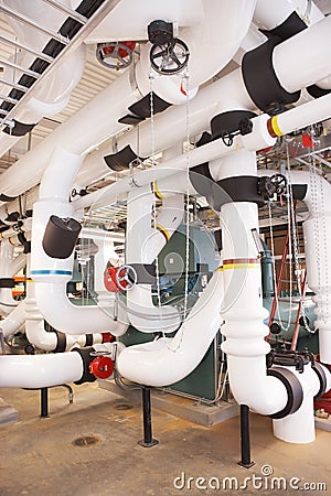 Insulated industrial piping in an HVAC system. Editorial Stock Photo