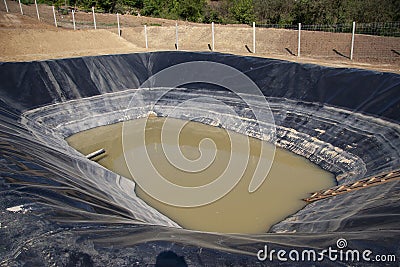 Insulated leachate pond part of landfill Stock Photo