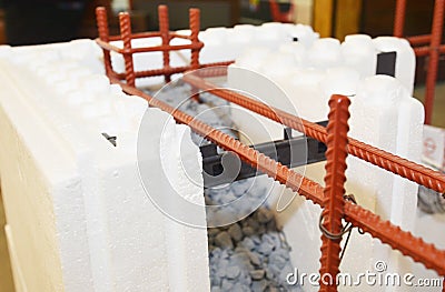 Insulating concrete forms ICF with reinforced concrete house walls. Insulating concrete forms ICF made of plastic foam Stock Photo