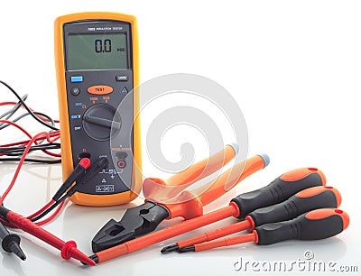 Insulation tester with tools isolated white Stock Photo