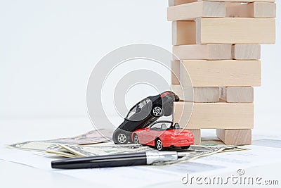 Insurance policy contract concept with toy model cars having a crash Stock Photo