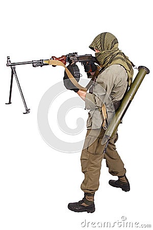 Insurgent wearing keffiyeh with machine gun Stock Photo