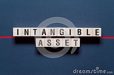 Intangible asset word concept on cubes Stock Photo