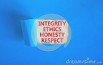 Integrity ethics honesty respect symbol. Concept word Integrity Ethics Honesty Respect on beautiful white paper. Beautiful blue Stock Photo