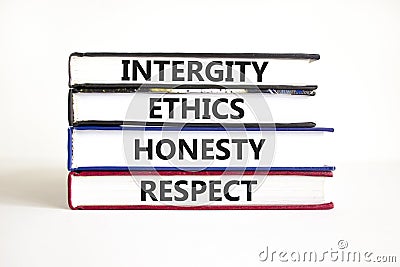 Integrity ethics honesty respect symbol. Concept word Integrity Ethics Honesty Respect on beautiful book. Beautiful white table Stock Photo