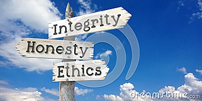 Integrity, honesty, ethics - wooden signpost with three arrows Stock Photo