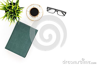 Intellectual entertainment concept. Books with empty cover near glasses, coffe, plant on white desk top view space for Stock Photo