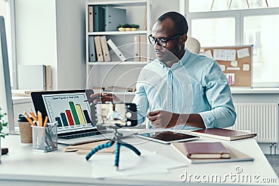 Intelligent young African man in shirt Stock Photo