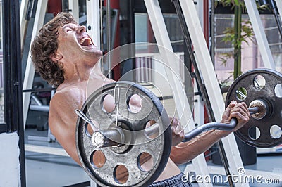 Intense barbell curl workout Stock Photo