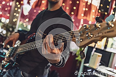 Intense bassist playing during live performance Editorial Stock Photo