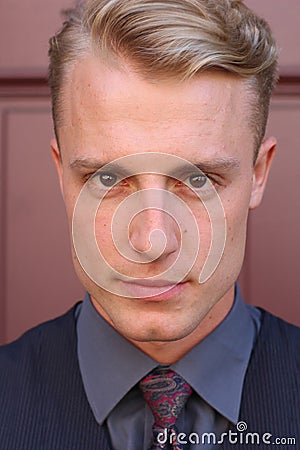 Intense dark portrait of a handsome man with scary eyes Stock Photo