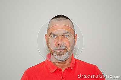 Intense middle-aged man with an enigmatic look Stock Photo