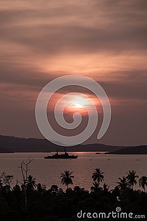 Amazing asian sunset with warship Stock Photo