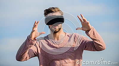 Interaction with digital surface. Gesture control. 3d visualization. Man explore VR sky background. VR technology and Stock Photo