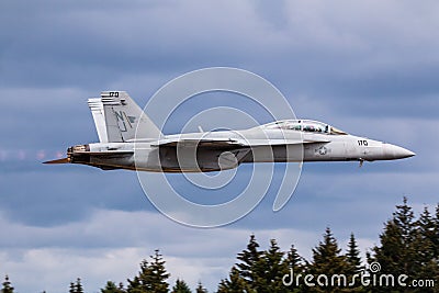 Interceptor jet flying low above the ground Editorial Stock Photo