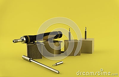 Interchangeable screwdriver set with different types of metal steel heads and bits. Stock Photo