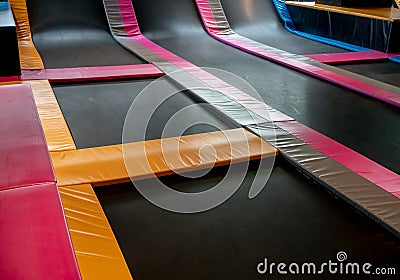 Interconnected trampolines for indoor jumping. New revolution pl Stock Photo