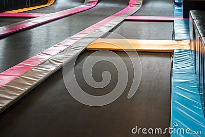 Interconnected trampolines for indoor jumping. Stock Photo