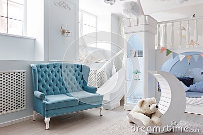 Interer of a spacious blue children`s room. decorative castle game Stock Photo