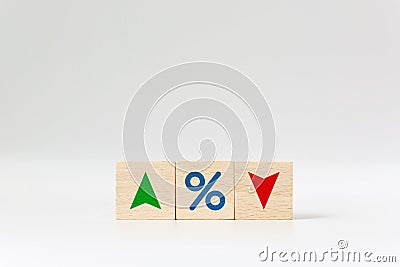 Interest rate financial and mortgage rates concept. Wooden cube block with icon percentage Stock Photo