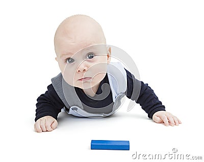 Interested baby with toy block Stock Photo