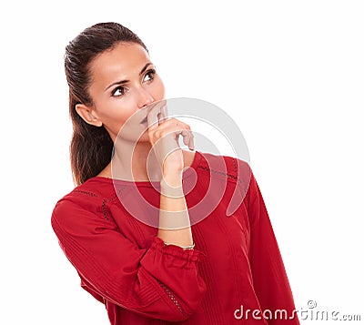 Interested hispanic woman looking to her left Stock Photo