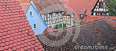 Interesting mash up of Red Tiled Medieval Roofs Stock Photo