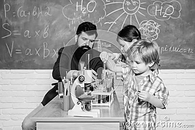 Interesting school classes. School education. School chemistry experiment. School club. Explaining chemistry to kid Stock Photo