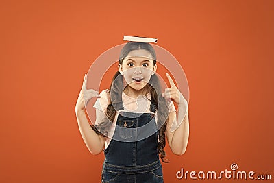 Interesting story for kid. Studying and relaxing. Motivation and inspiration.Find balance. Book on her head. Harmony Stock Photo