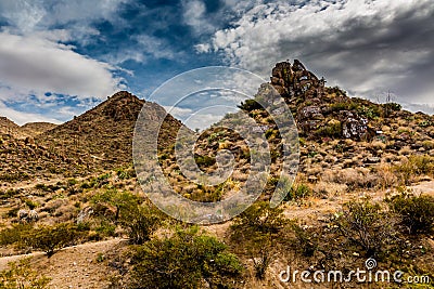 Interesting West Texas Landscape of Desert Area with Rocky Hills and Graffiti. Stock Photo