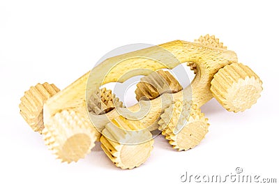 Wooden massager on wheels with spikes and projections Stock Photo