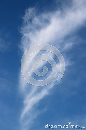 Interestingly shaped wispy feathery white cloud Stock Photo
