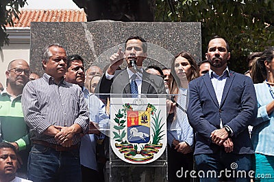 Interim President of Venezuela Juan GuaidÃ³ speaking at a Town meeting in Caracas Editorial Stock Photo