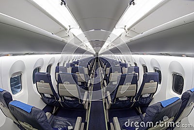 Interior of an airplane with two rows of seats Stock Photo