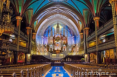 Interior and altar of Notre-Dame Basilica of Montreal - Montreal, Quebec, Canada Editorial Stock Photo