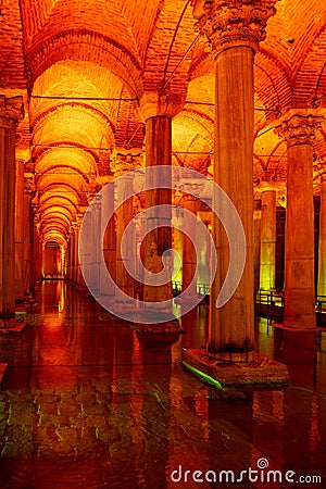 Interior of ancient palace featuring ornate columns and classic lamps in Istanbul, Turkey Editorial Stock Photo