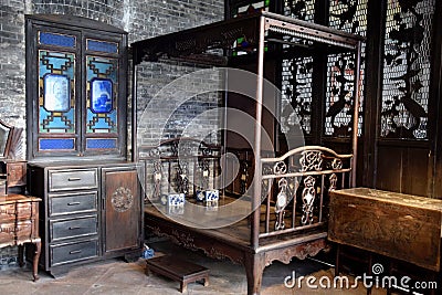 Interior with antique wooden furniture. Stock Photo