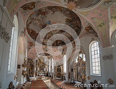 Interior architecture with furniture decorations frescoes and sculptures of the church of Paul Catholic Parish and St Peter in Editorial Stock Photo