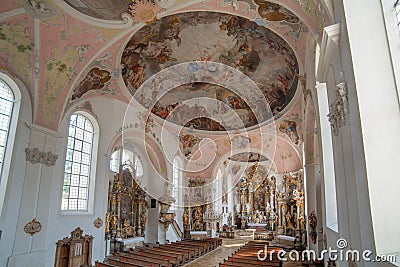 Interior architecture with furniture decorations frescoes and sculptures of the church of Paul Catholic Parish and St Peter in Editorial Stock Photo