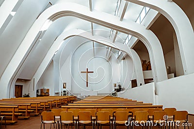 Interior of asymmetric Alvar Aalto church in Riola Italy Stock Photo