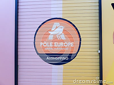 Interior of Auchan supermarket and PÃ´le Europe mall. Auchan is a French international retail group and outlet Editorial Stock Photo