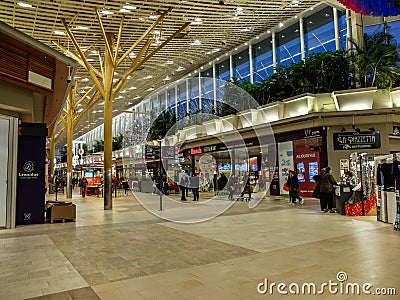 Interior of Auchan supermarket and PÃ´le Europe mall. Auchan is a French international retail group and outlet Editorial Stock Photo