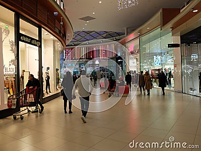 Interior of Auchan supermarket and PÃ´le Europe mall. Auchan is a French international retail group and outlet Editorial Stock Photo