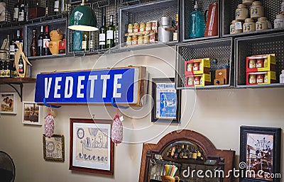 interior of a bar with lots of vintage products in the city of bath Editorial Stock Photo