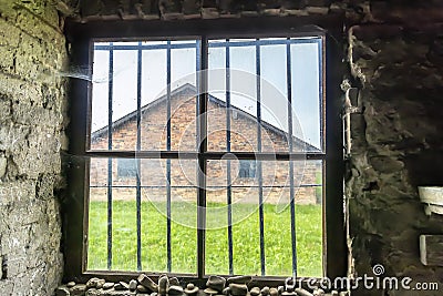 Interior of barrack with Prisoner`s beds, bunks inside barrack in Auschwitz Birkenau. Nazi concentration camp Auschwitz II, built Editorial Stock Photo